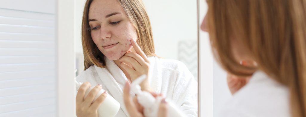 Woman looking at skincare products